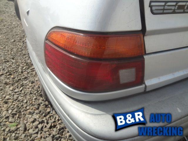 Left taillight for 93 94 95 96 escort ~ htbk   4838214