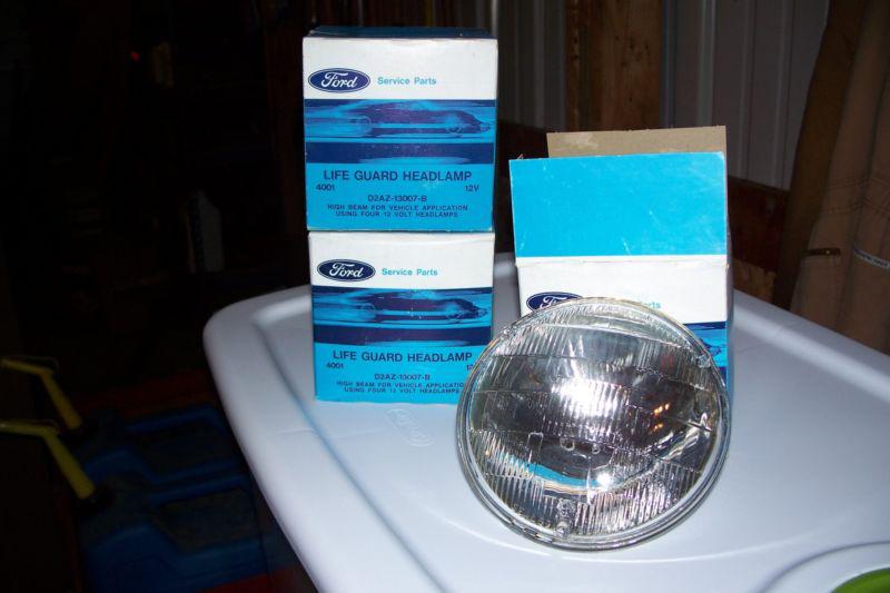 Nos pair ford factory sealed hi beam headlamp bulbs