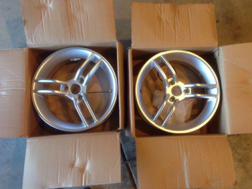 Canam spyder rs oem front wheels. never used. auction is one wheel.