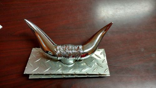 Front hood mounted chrome steer horn emblem ornament w/base.