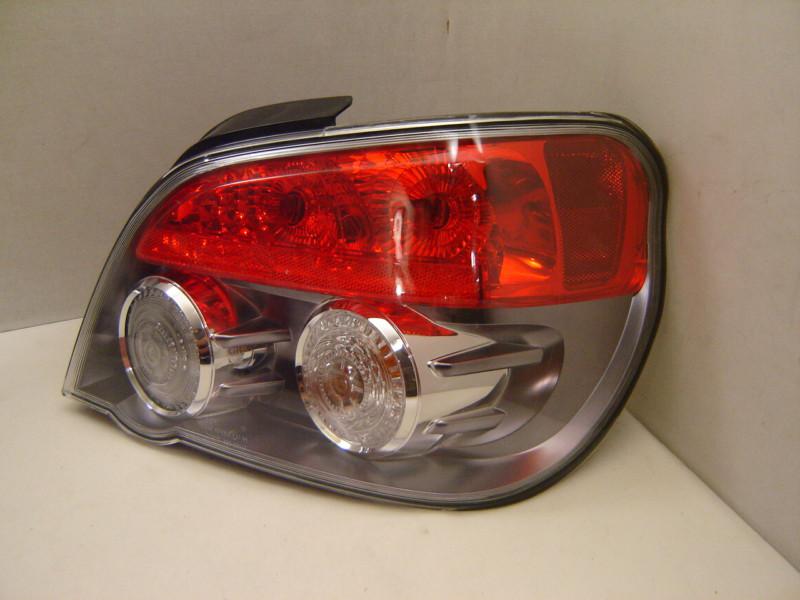 Subaru impreza right tail light 06 07 oem painted  (titanium) inner housing