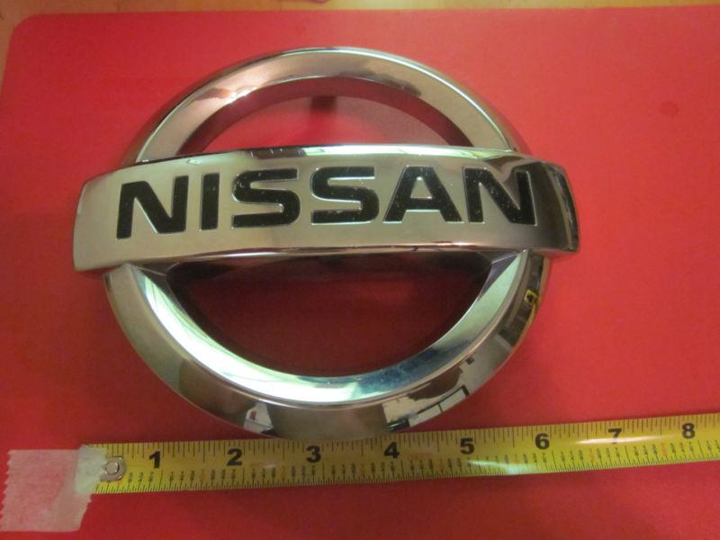 05-12 nissan xterra frontier pathfinder front grille emblem oem # 62890-ea500