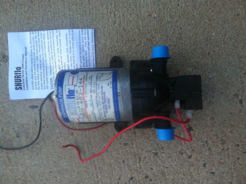 12 volt shurflo pump model 2088-422-144 ( used )