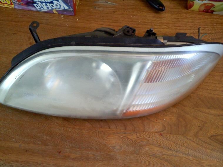 1999 ford windstar van used left headlight assm. 00 01 02 03