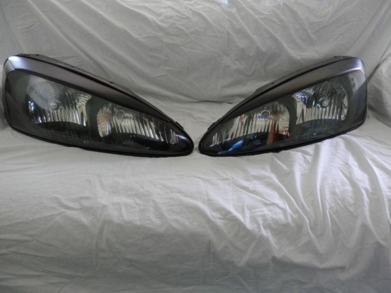 2004-2008 pontiac grand prix headlights with aftermarket blackouts