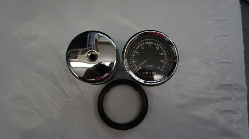 Used harley davidson tach 107612 with housing and rubber gasket tachometer