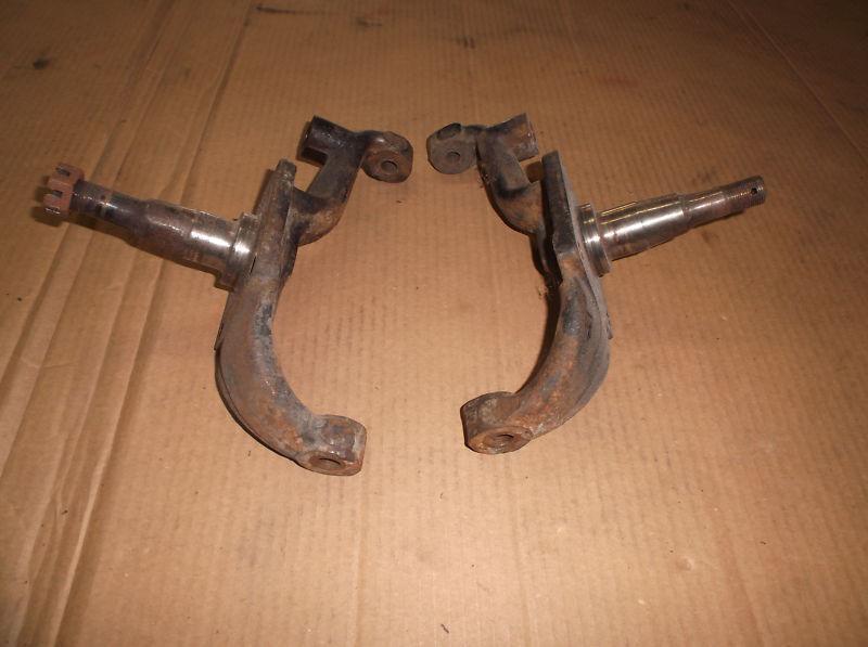 Pair of good used stock height front spindles ,steering knuckles 57 chevy