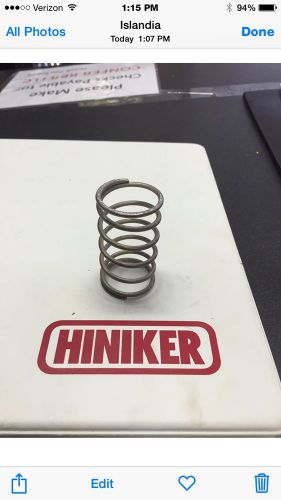 Hiniker sander spinner shaft top spring holds pressure on shaft