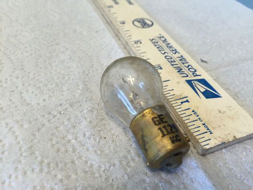 Ford; chrysler; gm; studebaker; old car light bulb,   pn 1129.   item:  0035