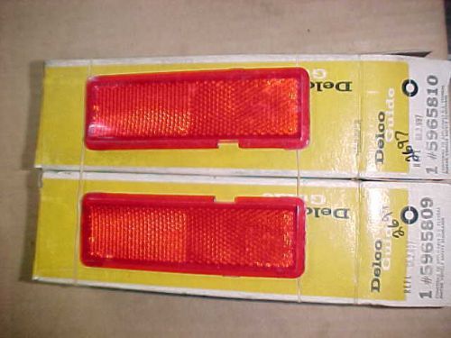 1973 oldsmobile 98 nos lamp reflectors 5965809 5965810