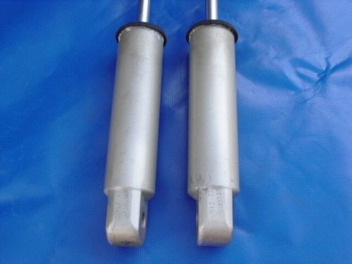 Nice set of 1973-1977 evinrude/johnson 65-70-85-115-135hp tilt assist shocks $23