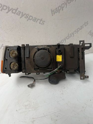 Volvo 940 headlight n/s passenger side