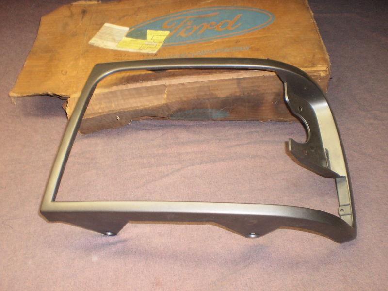 Ford 92,96 argent headlamp door lh orig. ford nos