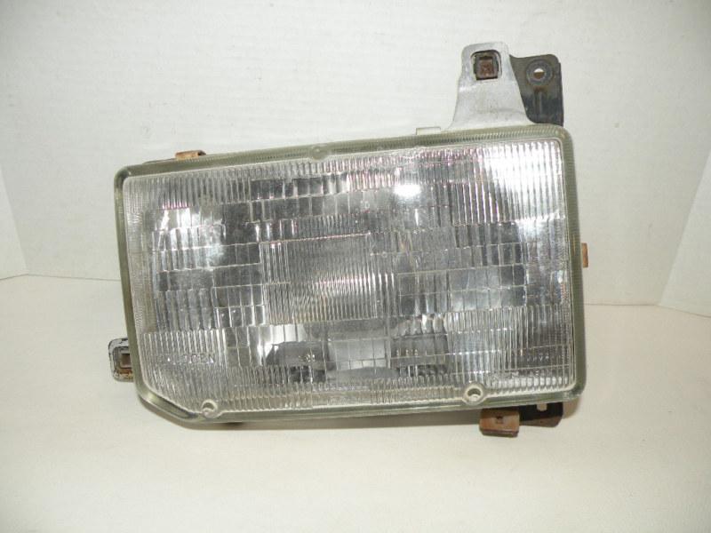 1987-1993 nissan pathfinder headlight  left side  110-23599  oem