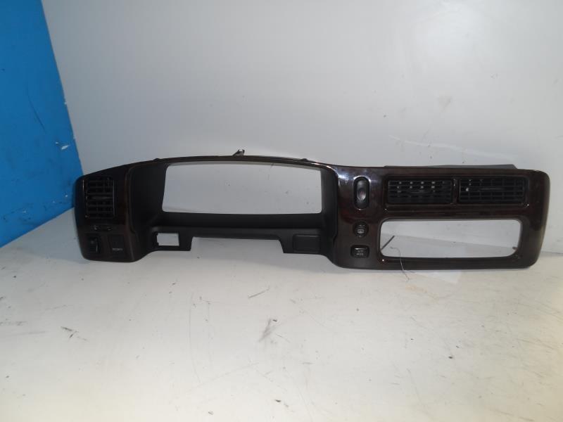 01 montero sport dash bezel woodgrain speedo bezel w/switches 13213