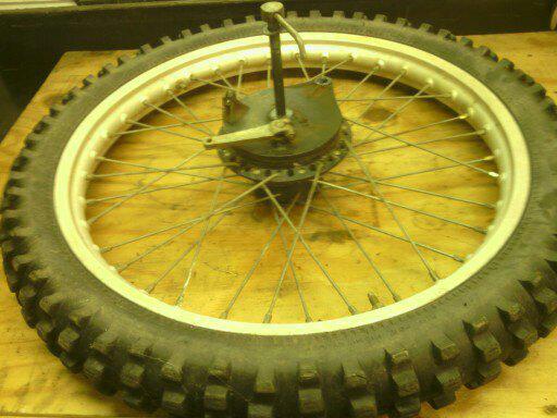 Kawasaki kdx175 80-82 front wheel and tire with threw bolt and brakes