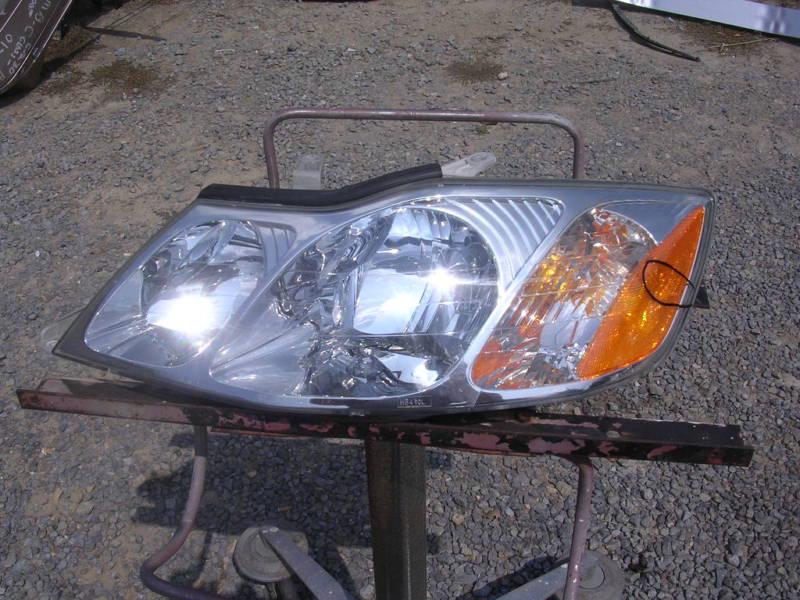 2000-2004 toyota avalon left headlight lamp oem