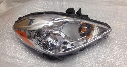 Used genuine oem passenger side headlight for 2012-2013 nissan versa models