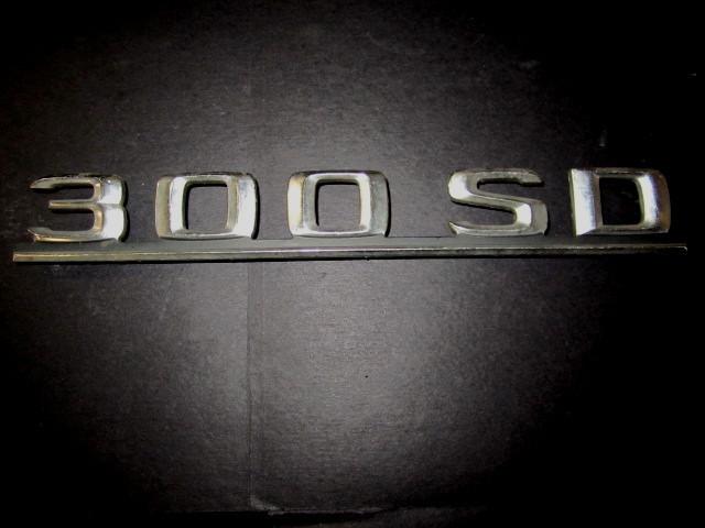 Mercedes benz 300sd oe emblem ornament  " 300sd "    oe# 126 817 07 15