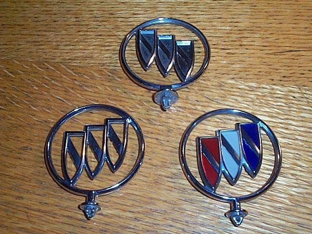 Lot of 3 different original, old buick hood ornaments 