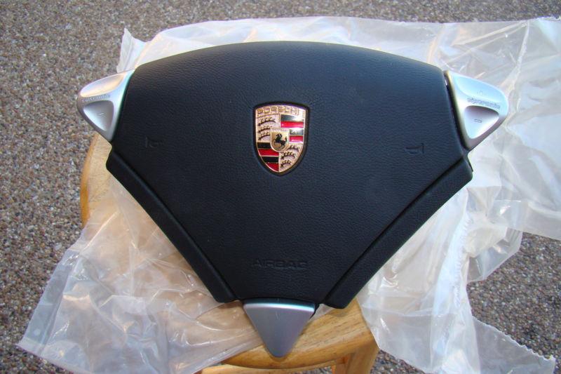 Porsche oem brand new cayenne black color non-controls steering wheel airbag