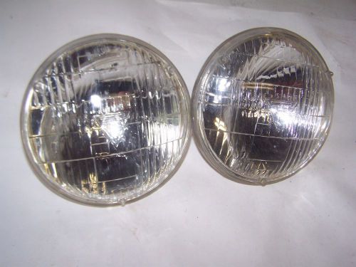 Oem  pair of t-3 high beam headlights