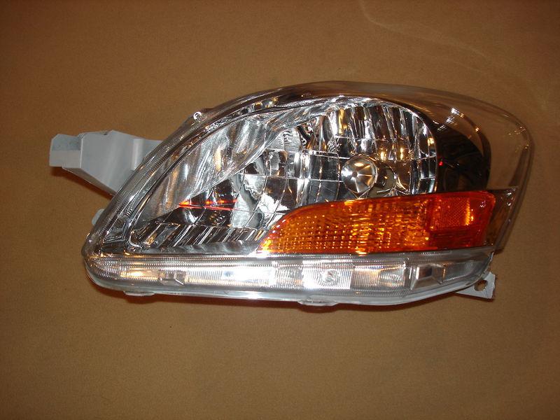 2010-2011 toyota yaris "sedan" "used" left headlight 