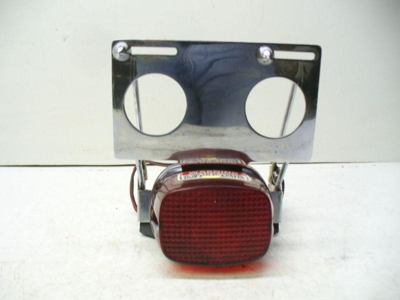 Harley late 80s fxstc fxwg chrome license plate holder & tail lamp.