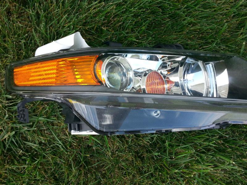 New acura tsx headlight, passenger, hid, xenon, w/bulbs and ballast oem