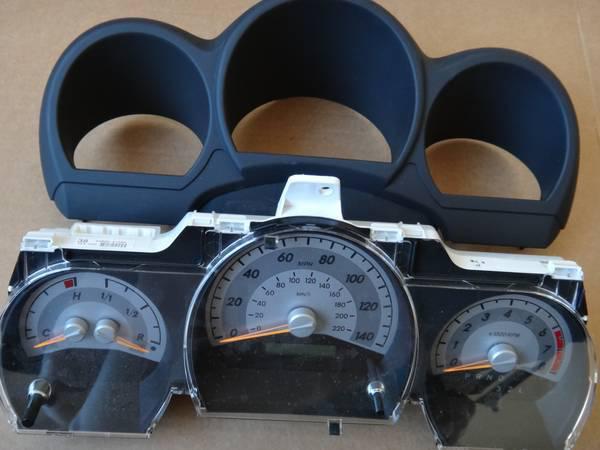 2010 tc speedometer cluster w/ cover