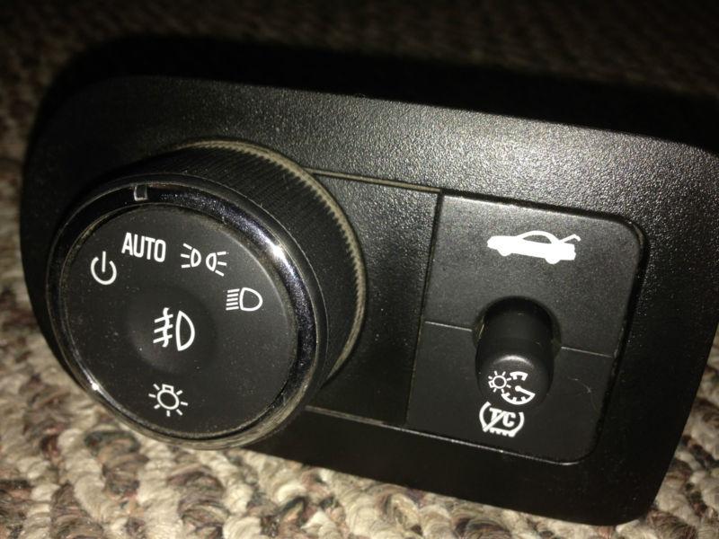 2005-2010 chevy impala headlight, trunk switch button. works