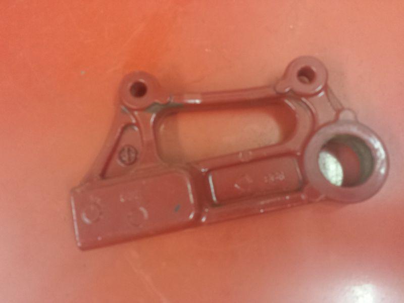 2004 kawasaki zx6r rear brake caliper mount bracket, powered coated red.