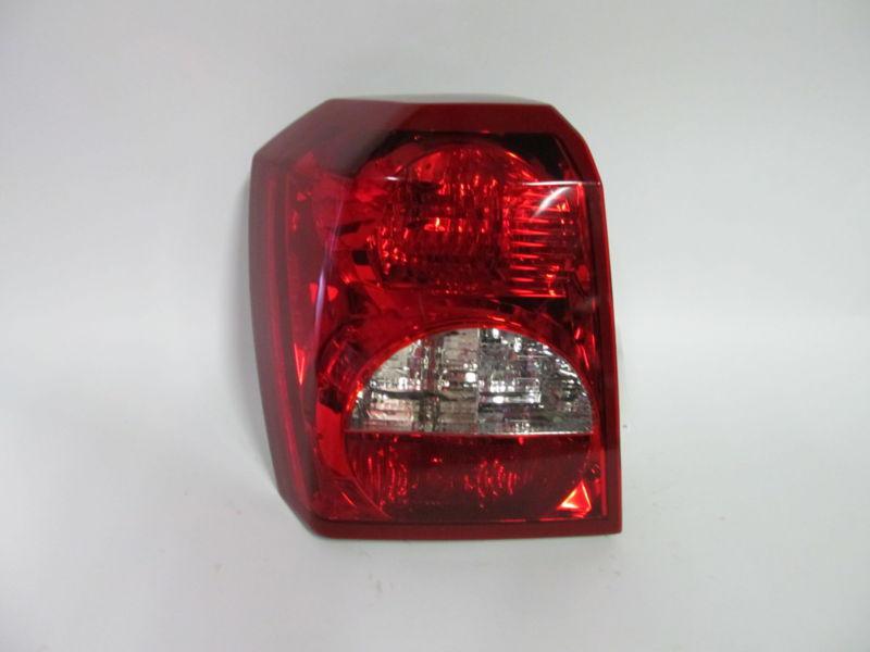 06 07 08 09 2010 2011 2012 dodge caliber oem left tail light nice!