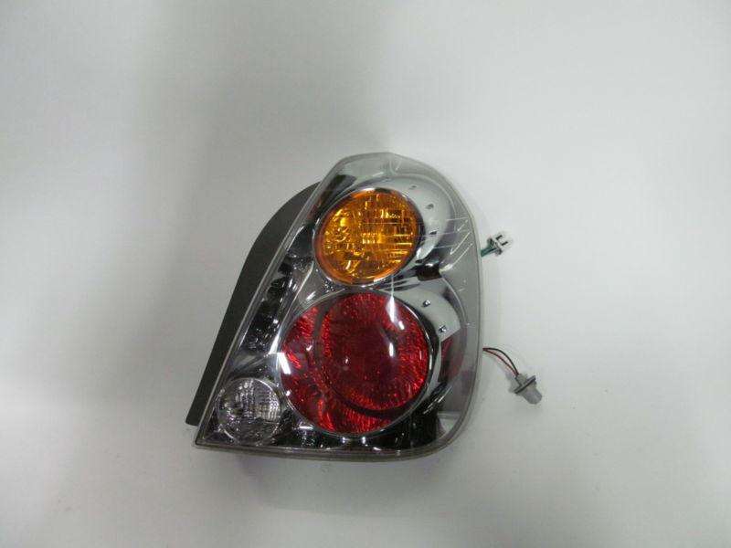 02 03 04 nissan altima oem right tail light nice!