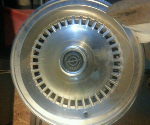 Old thunderbird wheel cover