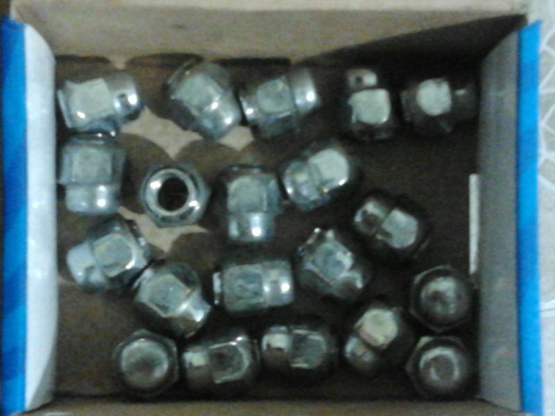 20 lug nuts size 12mm x 1.25 off of a nissan rogue oem