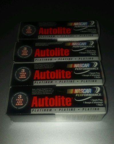 4 new autolite platinum spark plugs  ap104