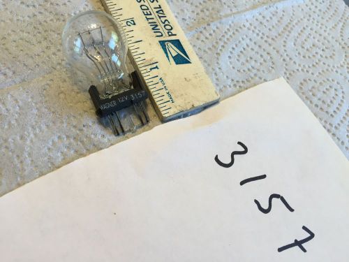 Ford; chrysler; gm; studebaker; old car light bulb,   pn 3157.   item:  0077