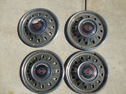 4 used chevy 67 impala ss hub- caps