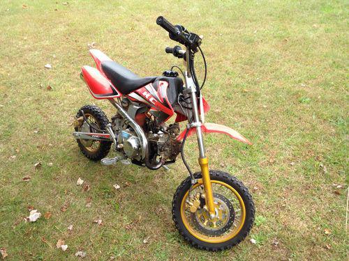 2005 kc 70cc pit bike motorcycle (4 spd, runs fine) + 2nd 70 cc for parts or fix