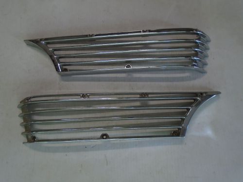 1963 64 cadillac pair of front side marker light bezels