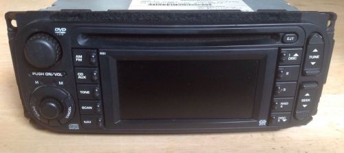 04-07 chrysler jeep navigation am/fm radio,cd,dvd p56038629a