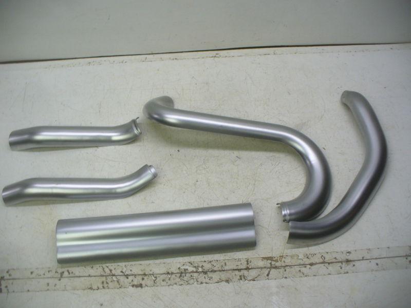 Harley late model xr satin silver exhaust heat shields, 5 pieces total.