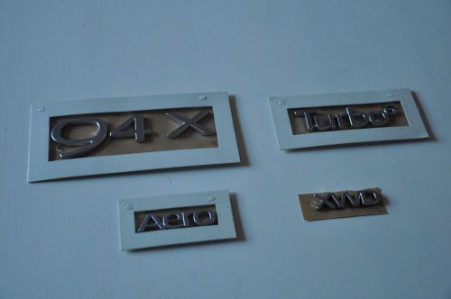 Saab 9-4x aero emblem, new sealed complete set 2011