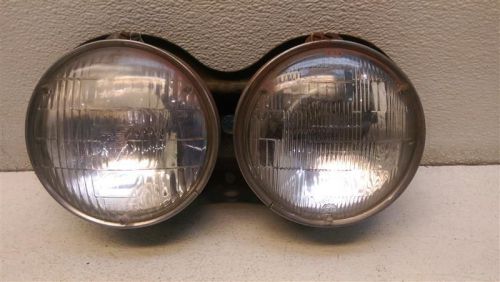 1962 cutlass pair of passenger right headlights w/bracket