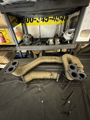 Prosport headers for subaru wrx / sti cerakoted and titanium wrapped