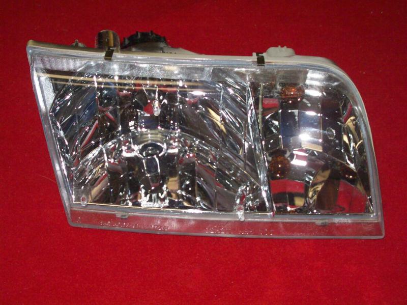 1998-2009 crown victoria left headlight with bulbs eagle eyes new in box