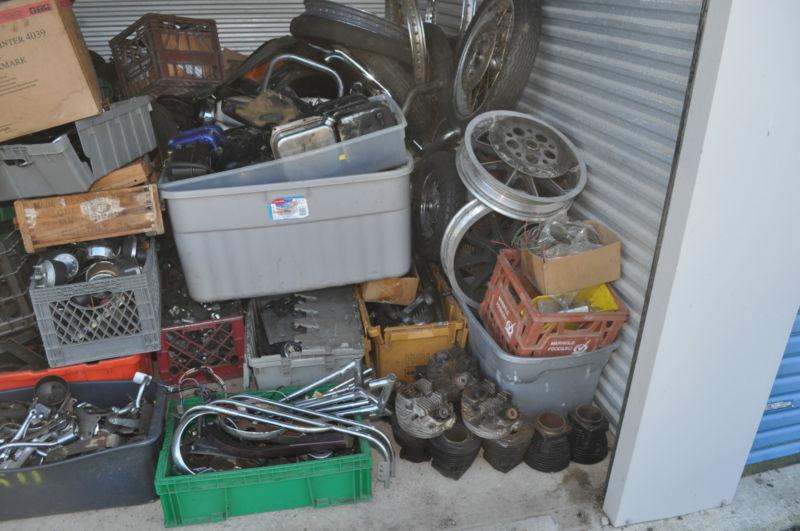 Harley motorcycle parts lot storage unit full of vintage and new packaged parts