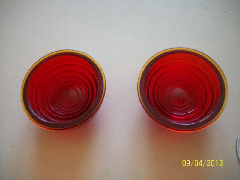 A pair of nos tail lens  for a 1941 plymouth  