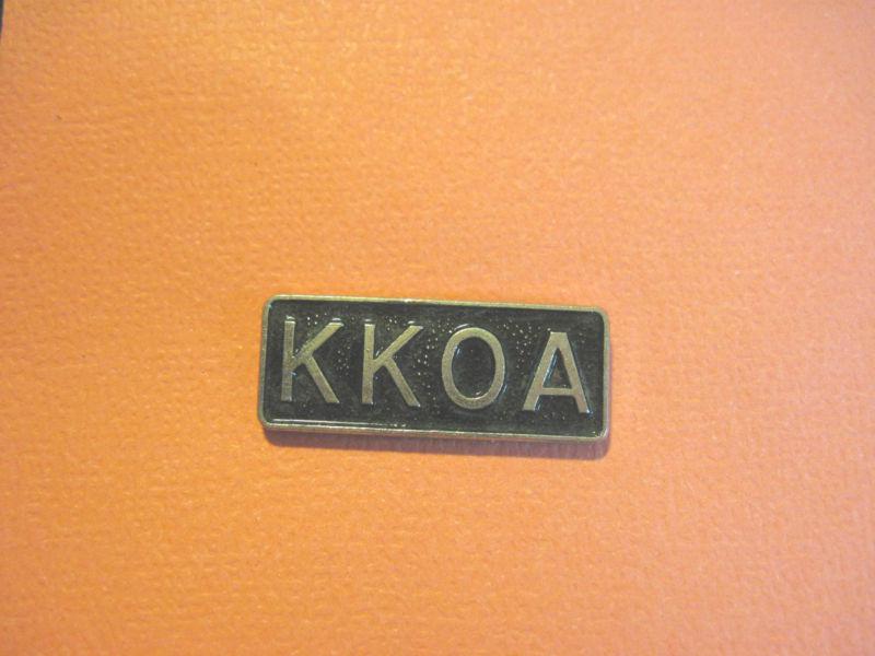 Kkoa   k k o a- hat pin, tie tac, lapel pin 